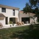 Vue finale du rendu esthétique d'un agrandissement maison terrasse ensoleillée salon de jardin, par BELCASTRO