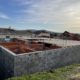 Construction par BELCASTRO du gros oeuvre d'une villa dfans la drôme, sous un ciel ensoleillé.